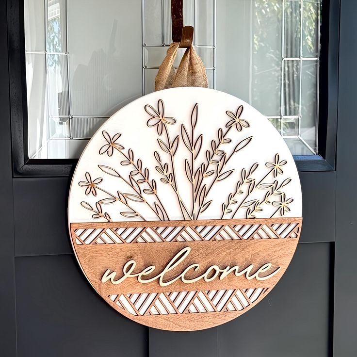 Please visit our Website for our full inventory underthecovers.shop Follow us on instagram https://www.instagram.com/underthecoversco/ Add a welcoming touch of charm and character to your home with our Wooden Door Hanger. This elegant piece not only greets guests with style but also serves as a unique decorative accent for your front door or entryway. The natural beauty of wood complements various home styles, from modern to rustic, adding a personalized flair to your décor. Crafted from precisi Welcome Door Hanger, Wooden Door Hanger, Home Styles, Small Doors, Wooden Door Hangers, Welcome Door, Vinyl Graphics, Wooden Doors, Door Hanger