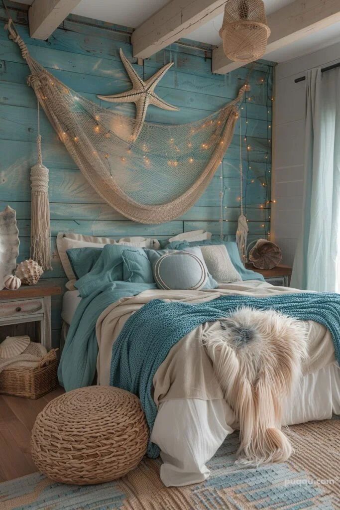 a bedroom decorated in blue and white with a hammock hanging above the bed