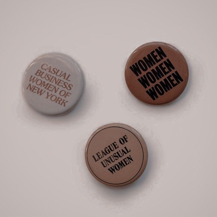 three buttons with words on them that say casual business women, league of unusual women