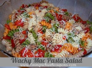 a bowl filled with pasta and sauce on top of a stove