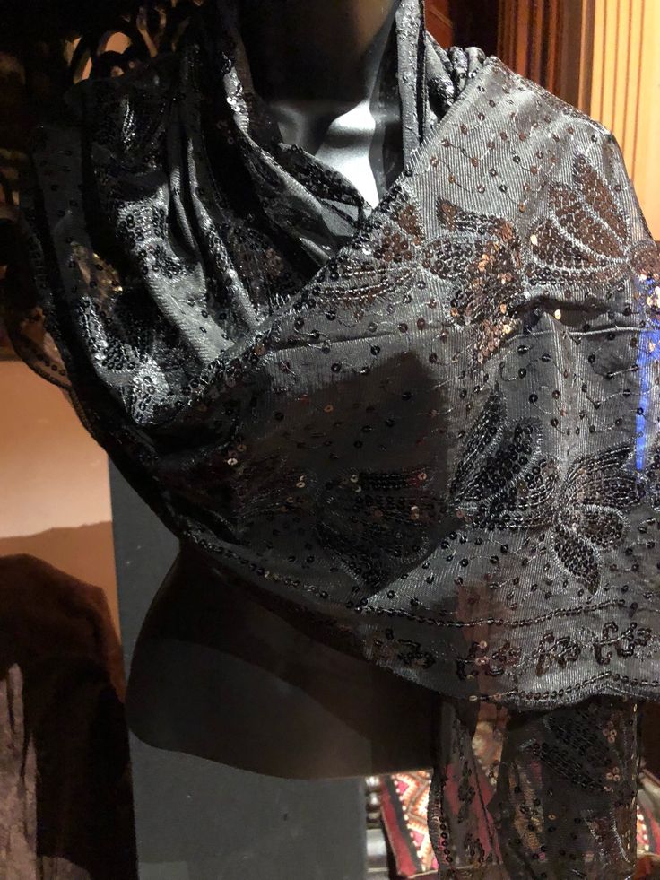 Vitage Styled Sheer black flower Sequined embroidered wrap Shawl https://www.etsy.com/listing/600300051/vitage-styled-sheer-black-flower Traditional Sequin Fabric For Evening, Elegant Fitted Festive Shawl, Elegant Black Embroidered Fabric For Formal, Black Elegant Embroidered Fabric For Formal Occasions, Elegant Black Embroidered Fabric For Formal Use, Elegant Black Embroidered Fabric For Formal Occasions, Fitted Elegant Shawl For Festive Occasions, Traditional Embroidered Dupatta For Evening, Elegant Shawl With Motifs For Festivals