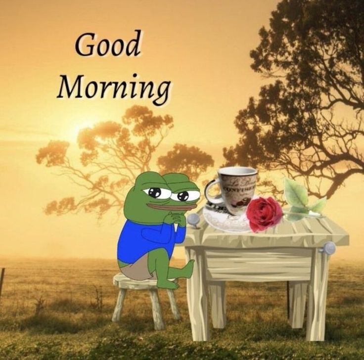 a cartoon frog sitting at a table with a coffee cup in front of him and the words good morning on it