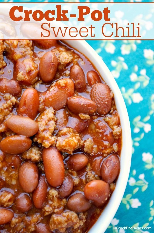 crock - pot sweet chili in a white bowl on a blue and green tablecloth