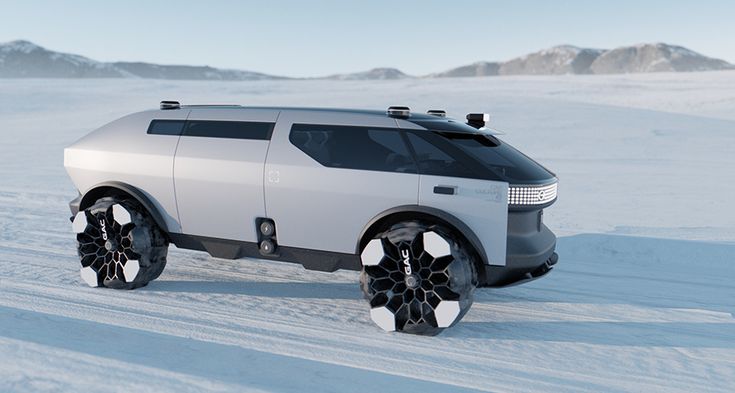 an electric vehicle is driving through the snow