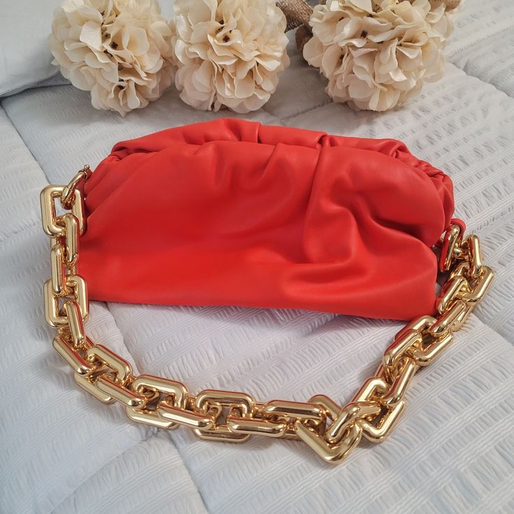 Gorgeous And Like New Authentic Bottega Venetta Chain. No Cards Or Dustbag But Will Include Dustbag Also Bag Will Be Authenticated Thru Posh. Purchased For Myself But Never Used It's Not My Style However It's A Gorgeous Gem. Color Is Like Coral Or Burnt Orange According To Website. Note Some Dust On Chains Seen On Last Pic. Maybe Can Be Removed Chic Orange Bag With Chain Strap, Orange Evening Bag With Chain Strap, Evening Orange Shoulder Bag With Chain Strap, Orange Shoulder Bag With Chain Strap, Luxury Orange Evening Bag, Luxury Orange Evening Bags, Elegant Orange Shoulder Bag For Evening, Luxury Orange Pouch Shoulder Bag, Chic Orange Clutch Shoulder Bag