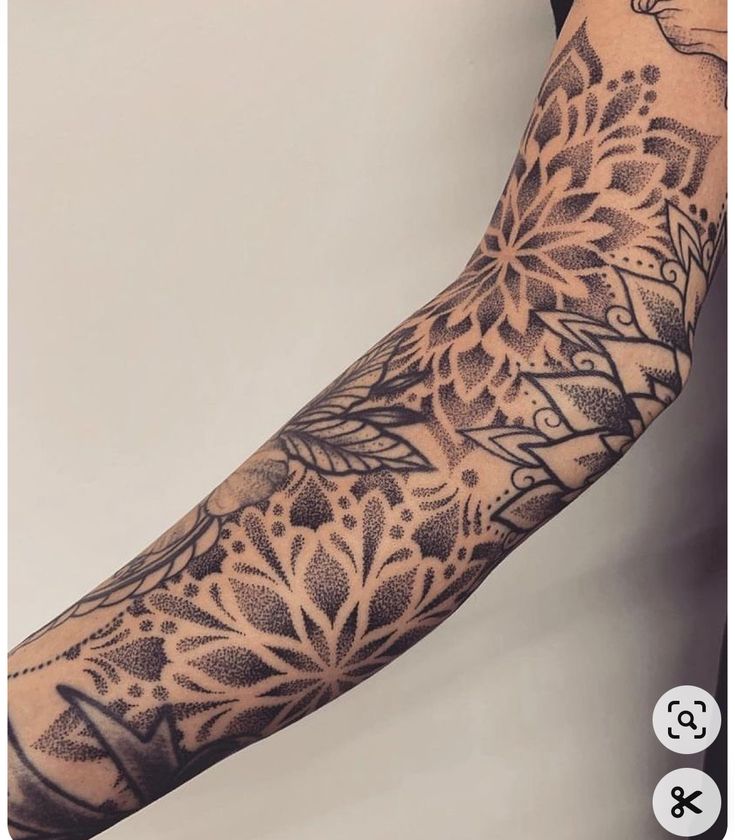 the arm is decorated with intricate designs