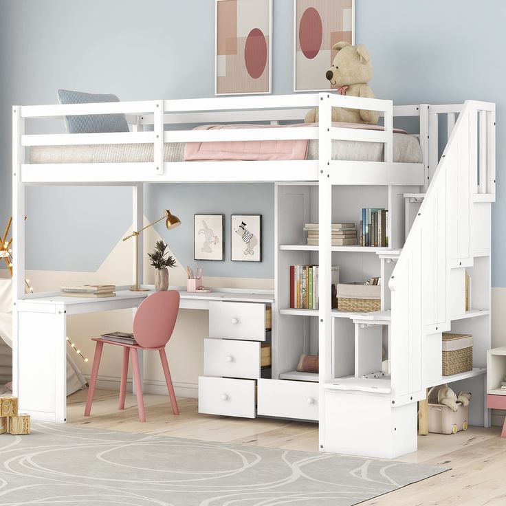 a white loft bed with desk and stairs in a child's playroom or bedroom