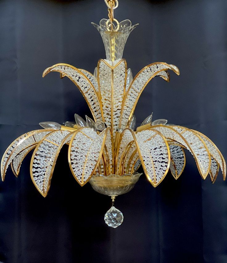 a fancy chandelier hanging from a ceiling