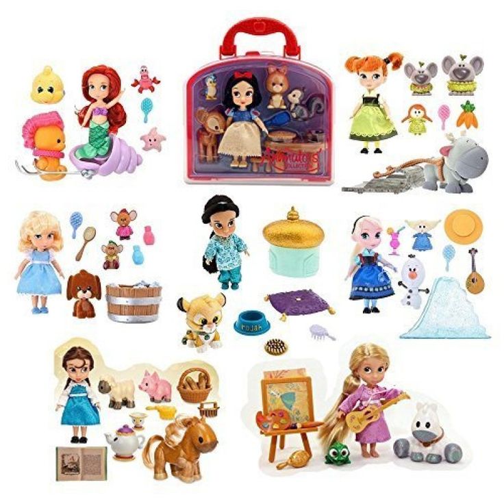 toys and dolls are arranged on a white background