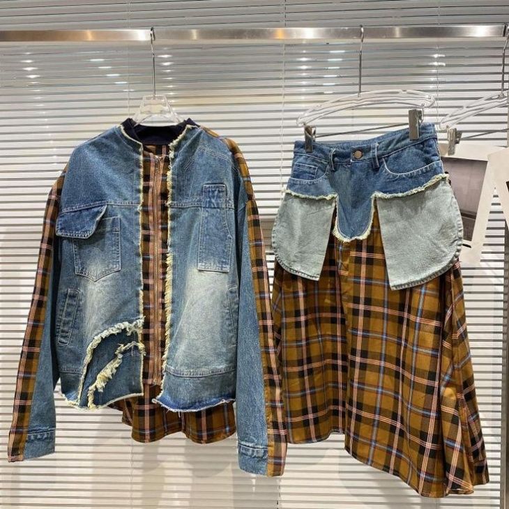 two pieces of clothing hanging on a rack