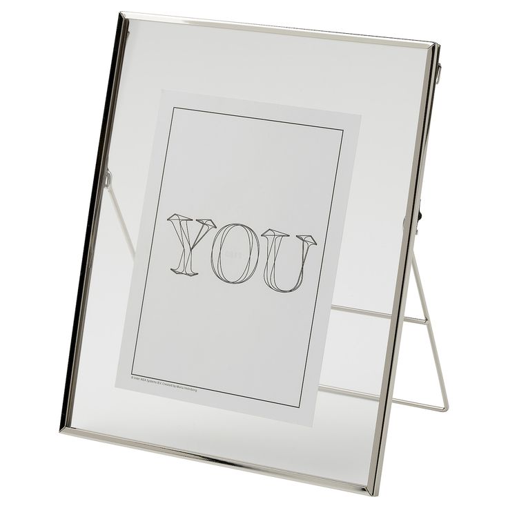 the word you is written in cursive writing on a white background with a silver frame