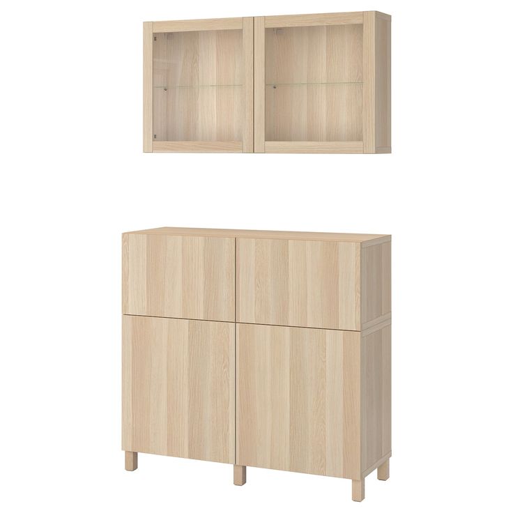 a wooden cabinet with two doors and one shelf on the side, next to another cupboard