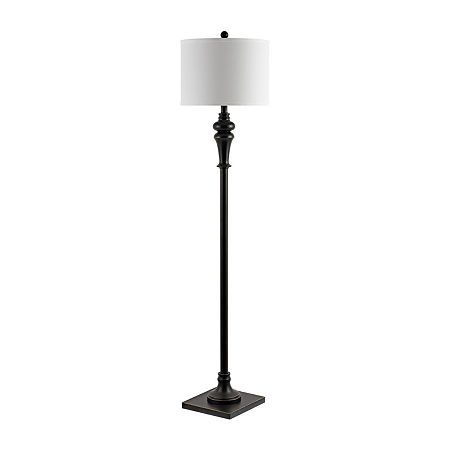 a black floor lamp with a white shade on the base and a square light bulb