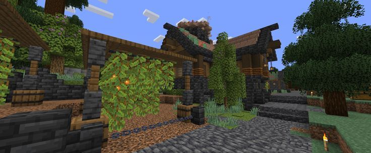 an image of a minecraft village in the woods