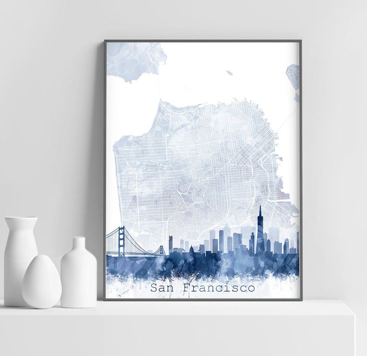 the san francisco skyline in blue watercolor on a white shelf next to vases