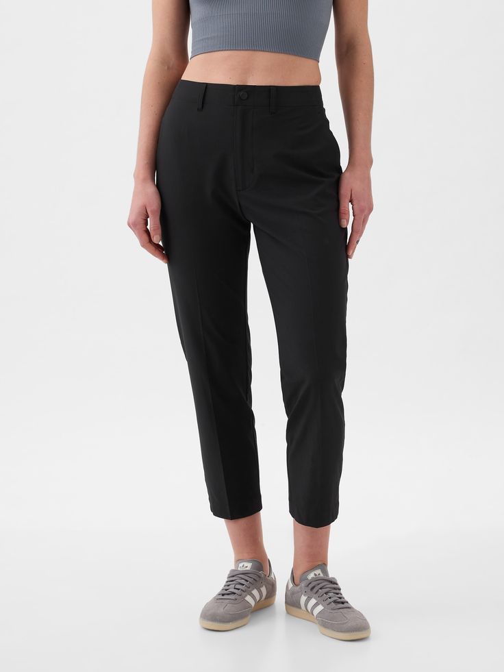 Soft stretch woven lightweight pants.  E-waist with button closure, zip fly.  Front slant pockets, back welt pockets.  This pant is made with 86% recycled polyester.  Using recycled materials helps to conserve resources and reduce waste.  This product was made in a factory that invests in gender equality and women’s empowerment.  Through RISE Reimagining Industry to Support Equality) and Gap Inc. ’s program P. A. C. E.  Personal Advancement & Career Enhancement), we support people who make our c High Rise Pants Outfit, Mom Casual Outfits, Pants Outfit Summer, Style Uniform, Summer Pants Outfits, Mom Clothes, Healthier Desserts, Lightweight Pants, Winter Styles