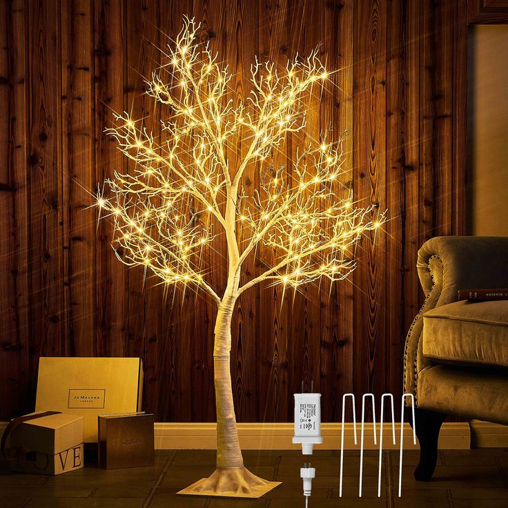 PRICES MAY VARY. 【HOME DECOR】: Totally 4FT high with full white lifelike twigs, this pre lit twig tree, create an elevated natural holiday scene 【EXQUISITE TEXTURE】: Hand crafted with vivid tree bark finish over the tree trunk and base gives it a natural woodland feel 【WIDELY USE】: All-weather design is made for outdoor yard, entryway porch decor. A special holiday display for Easter, Thanksgiving, Christmas fireplace, kitchen, living room, party decor 【DIY BRANCHES】: Flexible yet sturdy branche Pre Lit Twig Tree, Tree With Fairy Lights, Living Room Party Decor, Diy Branches, White Twig Tree, String Lights Inside, Fairy Lights In Trees, Joy Decorations, Weather Design