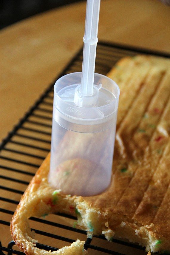 a toasted sandwich with a plastic cup on it