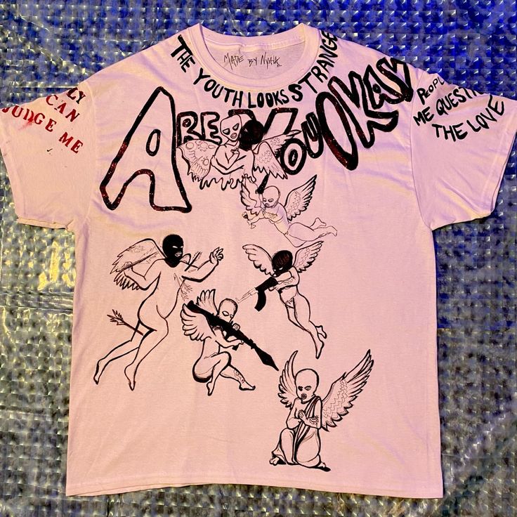 Custom 1 Of 1: Made By Nyala Hand Painted/Drawn Angels Scene With Quotes On Sleeves, Collar, And Chest With Accents Of Glitter On A 100% White Cotton T-Shirt. (Yes, Safe To Wash!) Hand Painted White T Shirts, Pink Cotton Top With Graffiti Print, Lilo And Stitch Shirt, Dare Shirt, Red Fishnets, Shirt Painting, Paint Shirts, Yellow Tees, T Shirt Painting