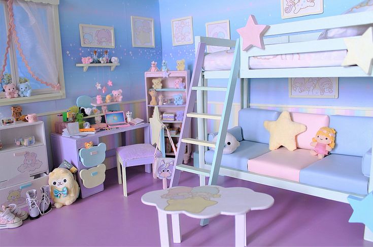 a dollhouse bedroom with bunk beds and toys