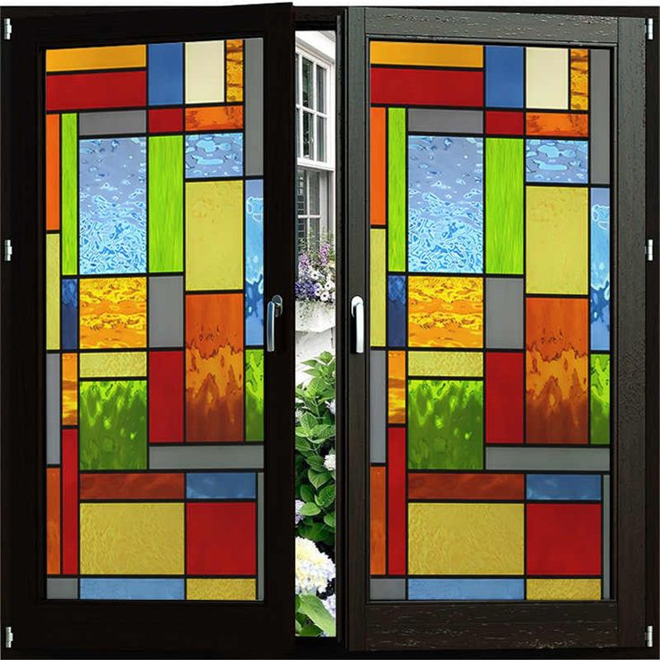 an open double door with colorful stained glass panels on the front and side doors,