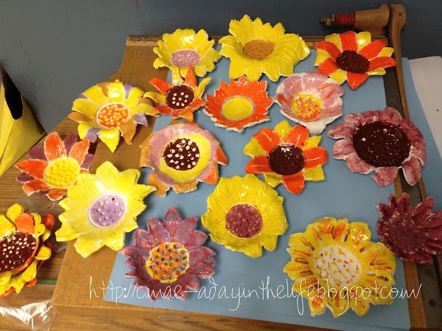 paper flowers are laid out on a table