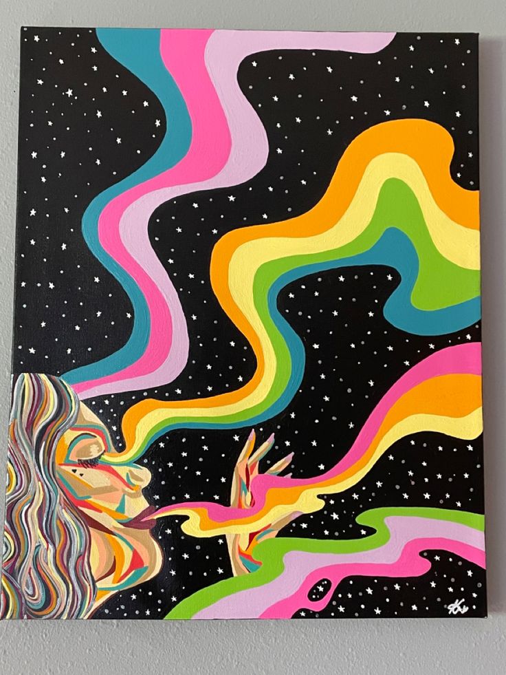 a painting on the wall of a unicorn with rainbow hair and stars in the sky