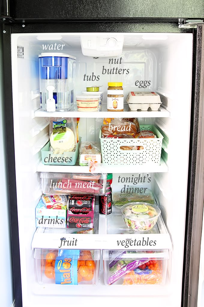 an open refrigerator filled with lots of food