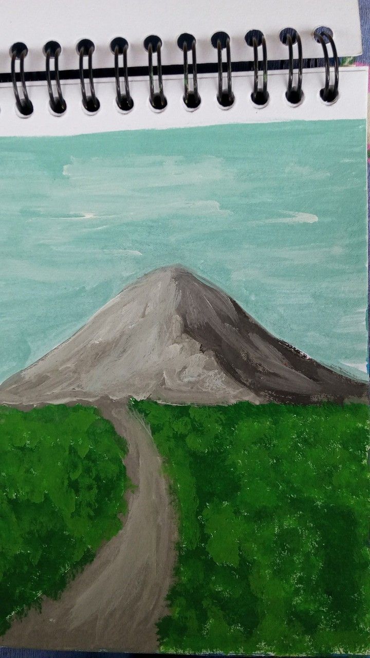 a drawing of a dirt road leading to a hill with a mountain in the background