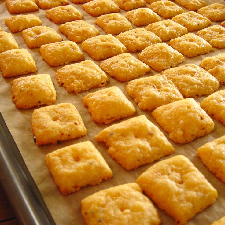 some food that is laying out on a baking sheet and ready to be baked in the oven