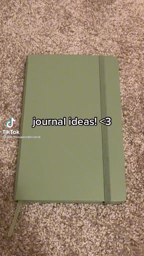 a green journal sitting on top of a carpet next to a white wall with the words journal ideas 3