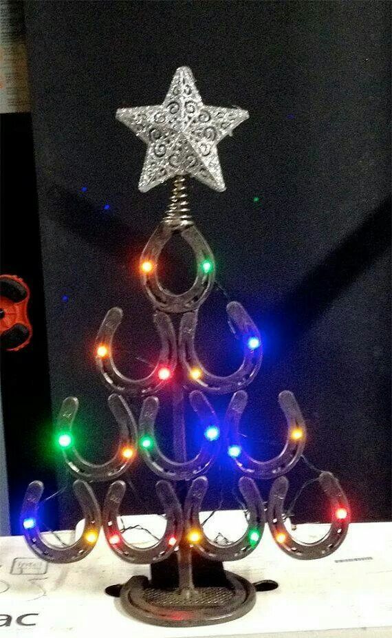 a lighted christmas tree made from horseshoes by anil art on etsy $ 75 00