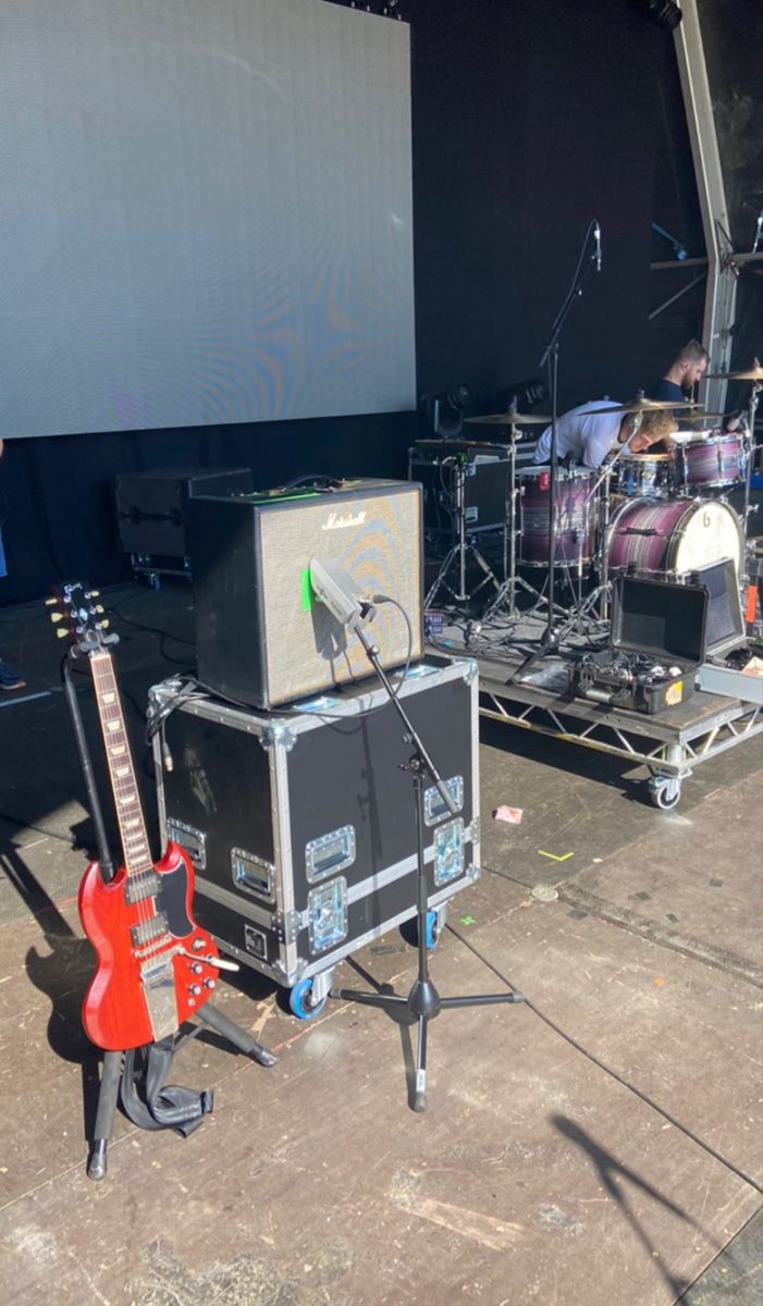 the stage is set up with guitars and amps