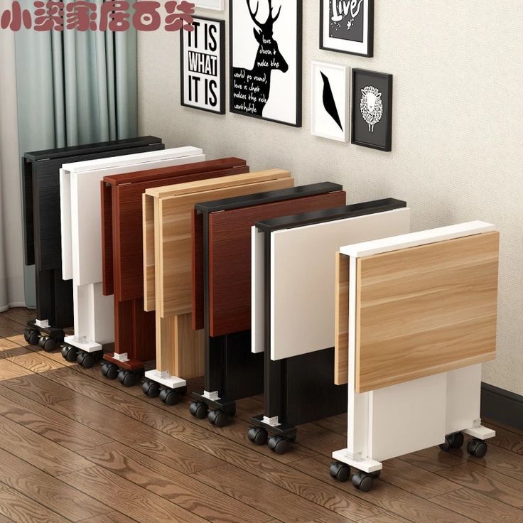 several different types of furniture on wheels in a room with wood flooring and white walls