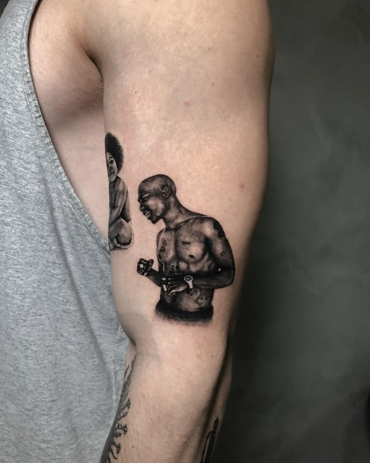 a man with a tattoo on his arm