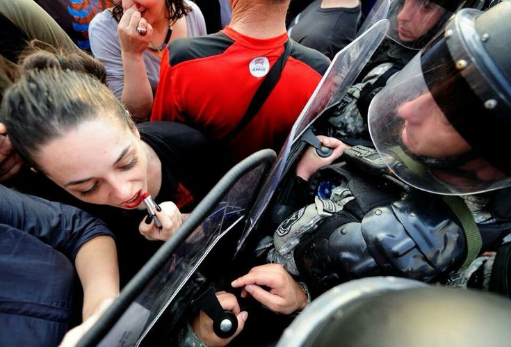 a woman is talking on her cell phone while surrounded by police