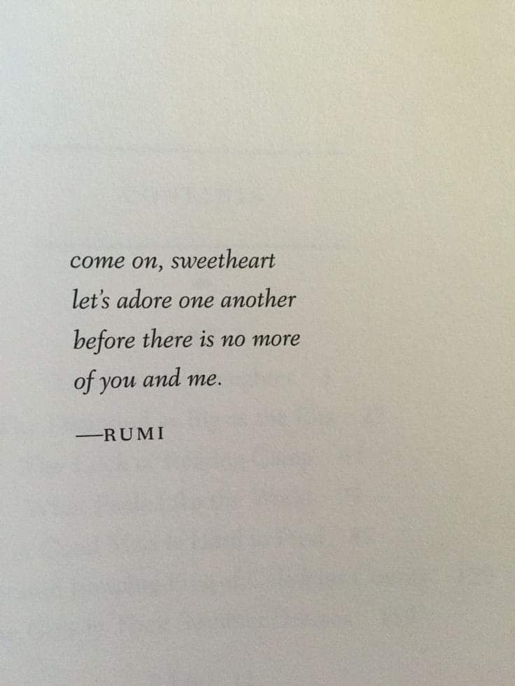 an open book with the words rumi written in cursive writing on it