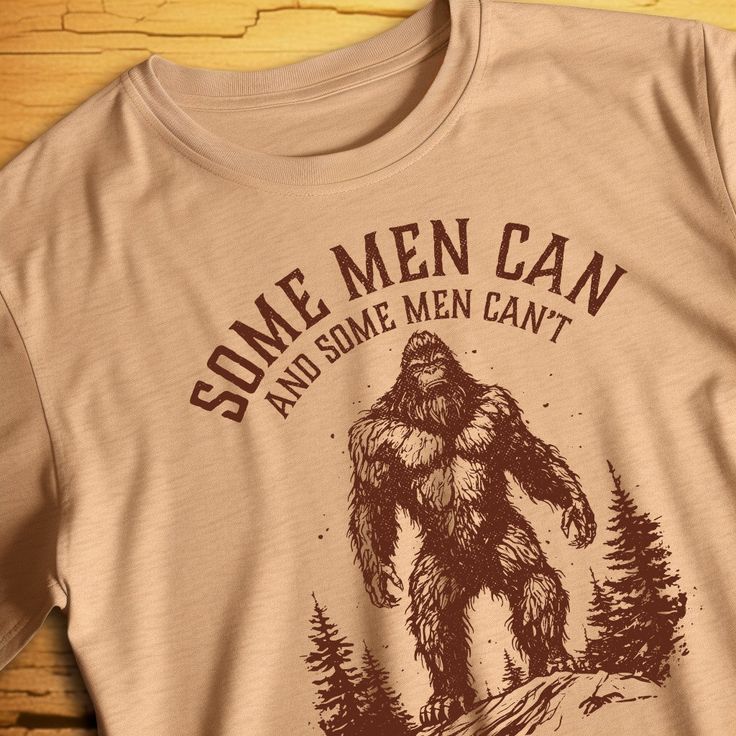 "Show off your rugged side with our \"Unleash Your Inner Bigfoot\" tee shirt! Featuring a bold graphic of the legendary creature himself, this tee is perfect for nature enthusiasts, hikers, and anyone who loves a good adventure. With the inspiring phrase \"Some Men Can and Some Men Can't\", this tee embodies the spirit of perseverance and determination. Wear it on your next camping trip or out in the wilderness and let it empower you to push beyond your limits. Made from high-quality materials, this tee is not only comfortable but also built to last through all your rugged outdoor pursuits. So why wait? Get ready to unleash your inner Bigfoot and show the world what you're made of with this epic tee! This unisex ultra cotton tee is a classic. Quality cotton construction means that designs Unique Tshirt Designs, Tshirt Design Diy, Bigfoot Shirt, Bigfoot Tshirts, Bigfoot Hunter, Finding Bigfoot, Unique T Shirt Design, Sasquatch Meme Funny, Legendary Creature