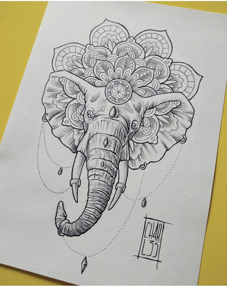 an elephant with flowers on its head is drawn in black and white ink by hand