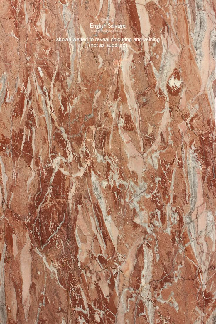 an image of marble that looks like it has been painted red and brown with white streaks