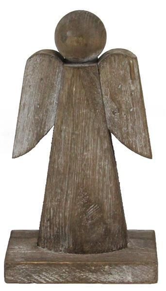 an old wooden angel figurine on a white background