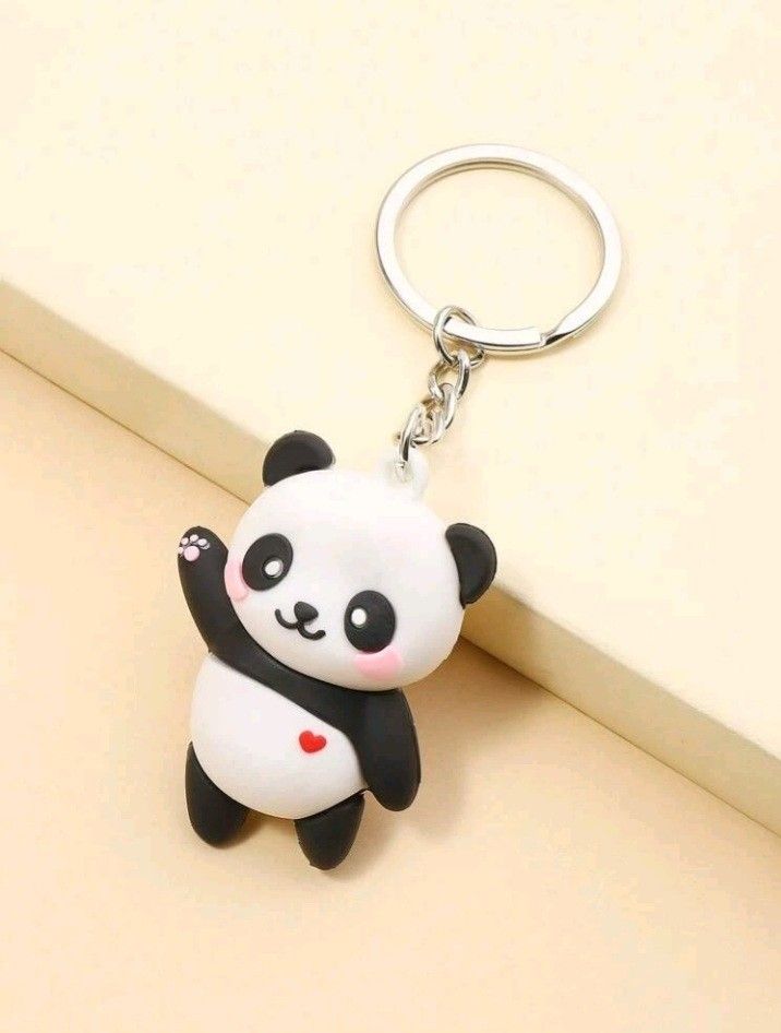 a key chain with a panda bear on it