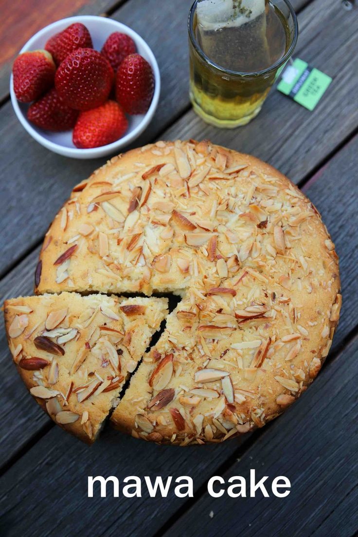 there is a pie and some strawberries on the table