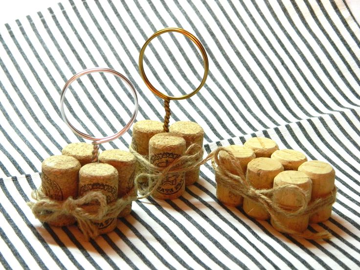 some wine corks are tied up and sitting on a table