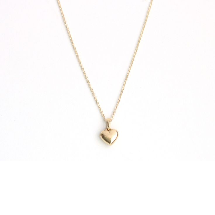 Capture hearts with our adorable 14 Karat solid gold puffy heart necklace. This charming piece is the perfect accessory to showcase your sweet and playful side. Crafted with love and attention to detail, it adds a touch of cuteness to any outfit and makes a delightful gift for yourself or a loved one. 11mm x 7.5mm *All our pieces are made to order and beautifully crafted specifically for you. Please confirm sizing before placing your order and allow 14-21 days from purchase to complete and ship Hallmarked Heart-shaped Dainty Necklace, 14k Gold Tarnish-resistant Heart Necklace For Valentine's Day, Puffy Heart Necklace, Gold-tone Heart Pendant Necklace For Valentine's Day, Valentine's Day Gold-tone Heart Pendant Necklace, Necklace Cute, Puffy Heart, 21 Days, Heart Pendant Necklace