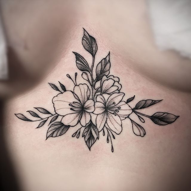 Delicate flower sternum piece by the homie Fhon Sternum Lily Tattoo, Tattoo Ideas Sternum Simple, Flower Tattoos Sternum, Upper Sleeve Tattoo Women Unique, Sternum Flower Tattoo Women, Peonies Chest Tattoo, Floral Tattoo Sternum, Underbreast Tattoo Floral, Peony Sternum Tattoo