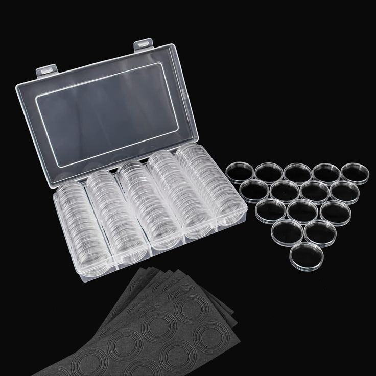 an open plastic case filled with lots of glasses