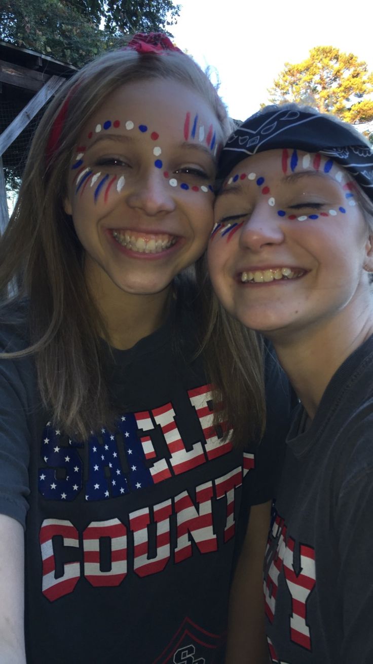 Red White And Blue Face Paint Dots, Red White And Blue Dots On Face, Home Coming Face Paint Ideas, Sprit Week Face Paint, Easy Fourth Of July Face Paint Ideas, Student Section Face Paint Ideas, Face Paint For Football Games Dots, Usa Theme Face Paint, Face Paint Ideas For School Spirit