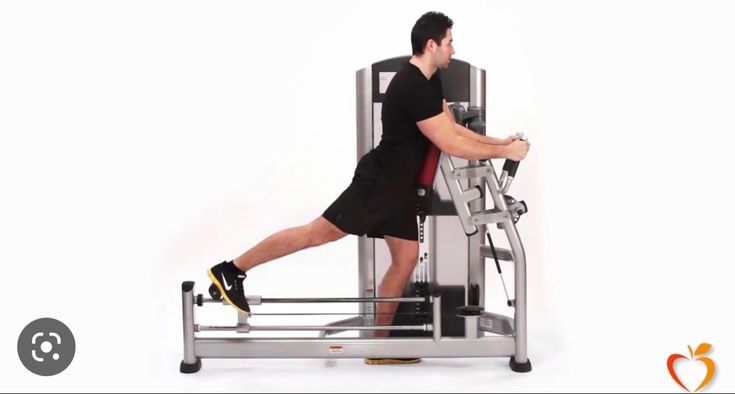 a man is doing exercises on an exercise machine