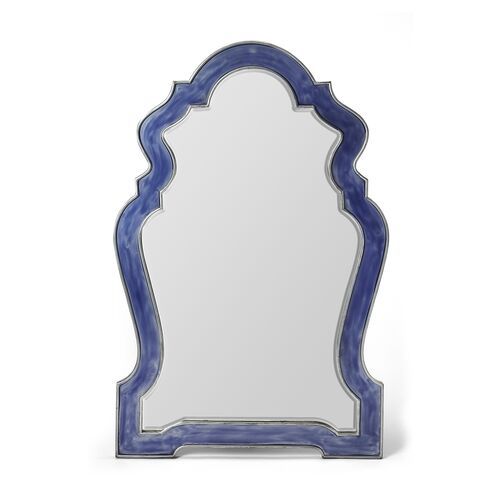 a blue and white mirror on a white background